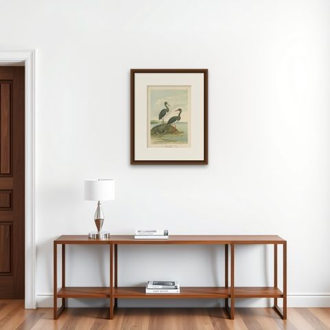 Black Storks by the Water, Elegant Antique Bird Chromolithograph c.1880, shown framed on a wall