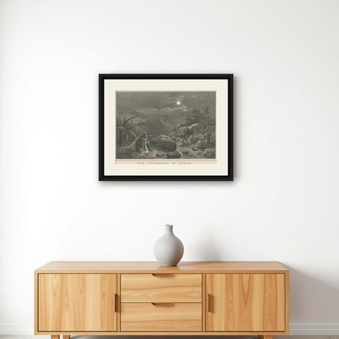 Antique Print of a Lion Hunt in Africa, shown framed on a wall