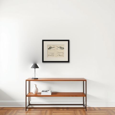 Set of 4 Antique Prints of the Lowland Viper and Other Snakes, shown framed on a wall