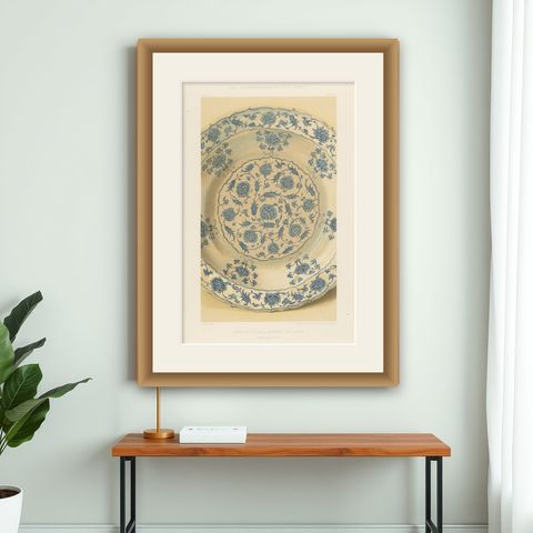 Persian Faience Dish with Blue Floral Ornamentation, J.Lessing, Berlin 1890, shown framed on a wall