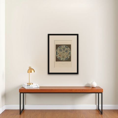 Persian-Turkish Faience Plate with Tulip and Artichoke Motif, J.Lessing, 1890, shown framed on a wall