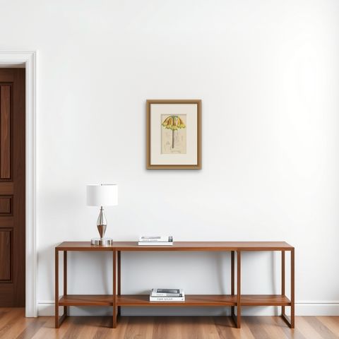 Fiery Elegance: The Fire Lily in Vintage Botanical Art, circa 1875, shown framed on a wall