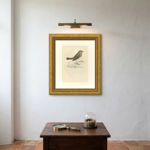 Robin Redbreast in Winter Snow by a Thatched Cottage, Morris, 1896, shown framed on a wall