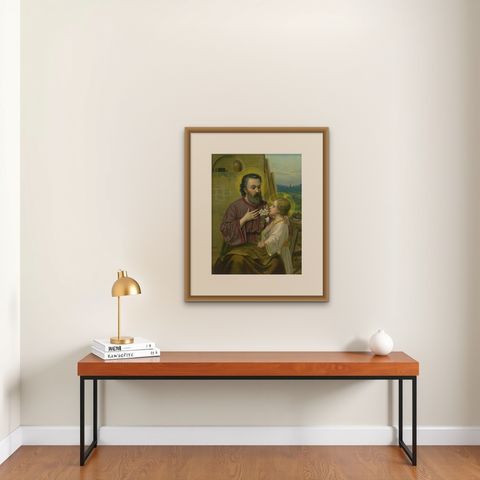 St Joseph and Child Jesus with Lily, Antique German Chromolithograph c.1900, shown framed on a wall